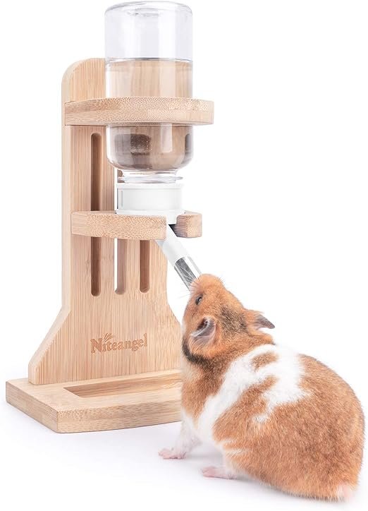 Niteangel Water Bottle with Stand designed for small pets like Syrian and dwarf hamsters, gerbil, mice, rats, and degus. The water bottle holds 4 ounces (approximately 120ml) and features an adjustable height slot for convenience, allowing it to suit various small animal sizes. The sturdy bamboo base provides stability and can be placed in glass tanks, aquariums, terrariums, or DIY hamster cages. Made from pet-safe and renewable materials, it is chewable by rodents
brainy buyz   brainybuyz.com