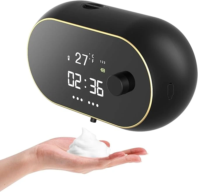 Monstake Automatic Soap Dispenser in black with a modern design, featuring a large oval smart display that shows clock, temperature, foam level, battery, and liquid status. This touchless dispenser, ideal for a Western bathroom, is wall-mounted and rechargeable, holds 450 ml of soap, offers adjustable foam levels, and is IPX5 waterproof.