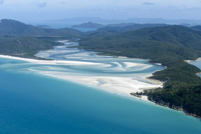 Breathtaking view of Whitehaven Beach on the Whitsunday Islands, recognized as one of the most beautiful islands, with pristine white silica sand